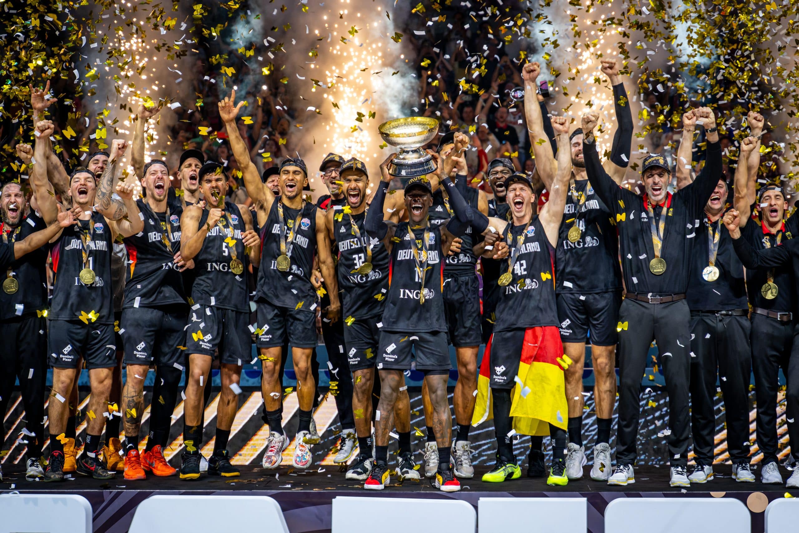 German basketball national team players in action during a game.